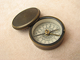 19th century brass cased pocket compass signed F.Barker & Son.